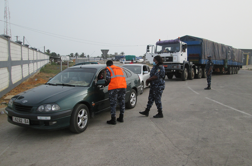 Officers in Benin carry out vehicle checks during Operation Weka.